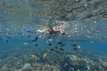 Woman snorkeling in sea - CAVF52807