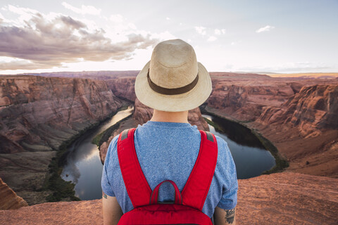 USA, Arizona, Colorado River, Horseshoe Bend, young man on viewpoint stock photo