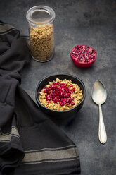 Bowl of granola with pomegranate seed - LVF07538