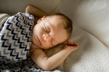 High angle view of cute baby boy sleeping on bed at home - CAVF53300