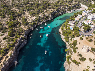 Spain, Balearic Islands, Mallorca, Llucmajor, Aerial view of bay of Cala Pi and Torre de Cala Pi - AMF06164