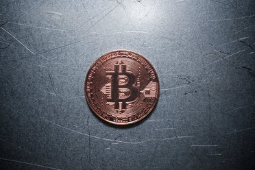 Overhead view of bitcoin on table - CAVF53475