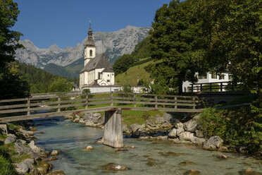 Germany, Bavaria, Berchtesgadener Land, Parish church St Sebastian in front of Reiteralpe mountain - LBF02189