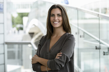 Portrait of smiling young businesswoman - BMOF00069