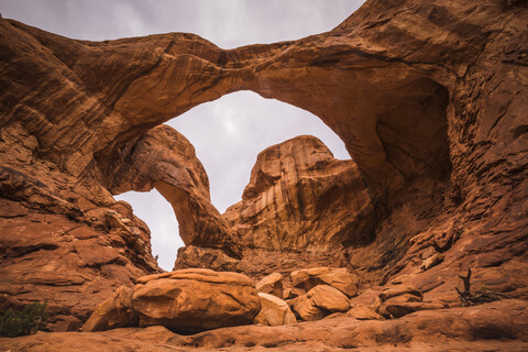 USA, Utah, Natural arch and rock formations at Arches National Park, Double Arch stock photo