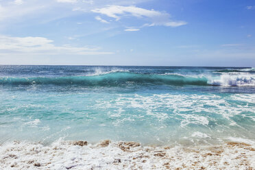 Idyllic view of waves in sea against sky - CAVF54211