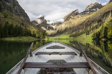 Cropped image of boat on lake by mountains - CAVF54723
