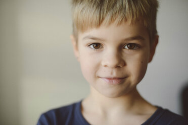 Portrait of confident boy at home - CAVF54862