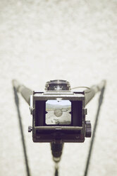 Overhead view of camera on sand at desert during sunny day - CAVF55186