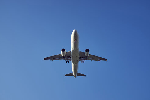 Passenger plane during landing, upward view - ELF01951