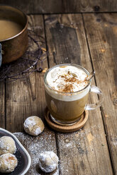 Pumpkin spice latte with a dollop of cream and some cookies - SBDF03835