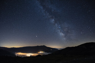 Italy, Umbria, Sibillini National Park, Milky Way over Sibillini mountains at night - LOMF00776