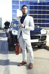 Young businessman in the city, portrait - JSRF00080