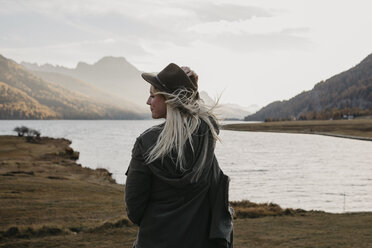 Young woman travelling through Switerland, looking at nature - LHPF00191