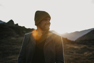 Mature man travelling through Switzerland, standing in nature - LHPF00193