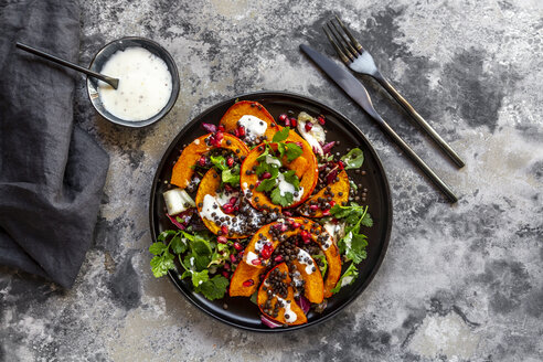 Autumnal salad with fried pumpkin, lentils, radicchio, pomegranate seeds, leaf salad and parsley with dressing - SARF03992