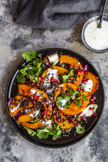 Autumnal salad with fried pumpkin, lentils, radicchio, pomegranate seeds, leaf salad and parsley with dressing - SARF03993