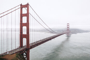 Golden Gate bridge over San Francisco Bay against clear sky - CAVF57067