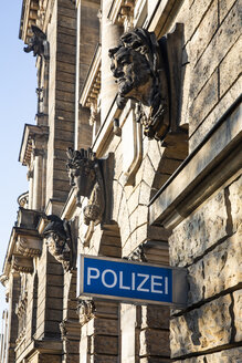 Geramny, Dresden, part of facade of police headquarter with sign 'police' - JATF01105