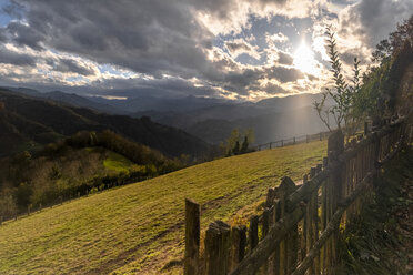 Spain, Asturias, Mountain landscape against the sun - MGOF03835