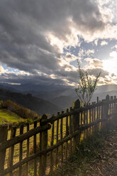 Spain, Asturias, Mountain landscape against the sun - MGOF03836