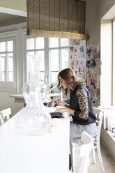 Young designer at work in an atelier - AFVF02045