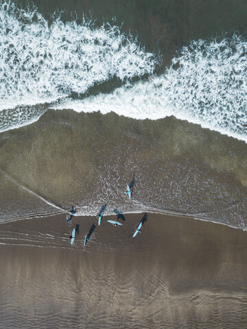 Indonesien, Bali, Kuta Strand, Surfer, lizenzfreies Stockfoto