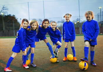 Portrait confident girls soccer team - HOXF04182