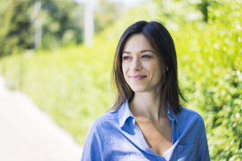 Portrait of a beautiful woman in nature stock photo