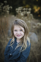 Portrait of cute girl on field - CAVF57851