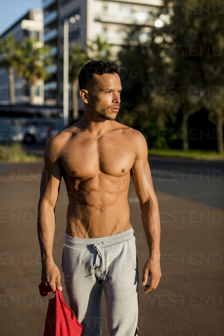 Portrait of a muscular man with bare chest, after workout stock photo