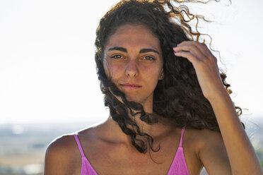Portrait of teenage girl, hand in hair - ERRF00248