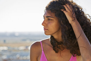 Portrait of teenage girl, hand in hair - ERRF00249