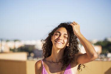 Portrait of teenage girl, hand in hair - ERRF00263