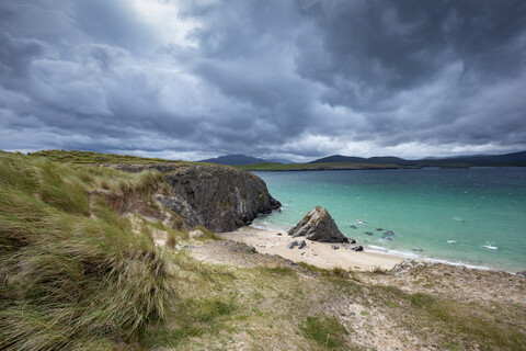 United Kingdom, Scotland, Sutherland, Cape of Balnakeil, cliff and beach, clouds stock photo