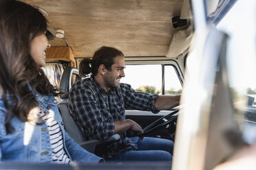 Affectionate couple doing a road trip in theit camper - UUF16167