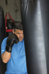 Male boxer practicing in gym - CAVF58837