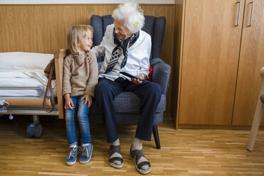 Aged woman and her great-granddaughter having fun together - PSIF00199