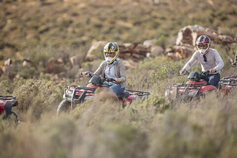 Group of people quad biking in South Africa stock photo