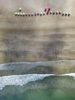 Bali, Kuta Beach, three beach umbrellas, aerial view - KNTF02512