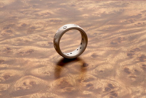 Silver ring on Mandora wood grain - SKAF00078