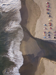 Indonesia, Bali, Canggu, Aerial view of Batu bolong beach, beach bar with armchairs - KNTF02526