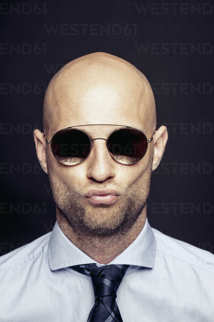 Portrait Handsome Bald Man in Stylish Sunglasses in Casual Trendy Black  Leather Jacket Near Brick Wall on Street. Cool Fashion Guy Stock Image -  Image of jacket, beard: 245281357