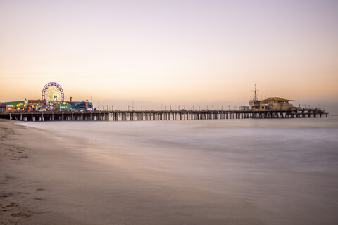 USA, California, Santa Monica, pier with Ferris wheel at twilight stock photo