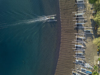 Indonesia, Bali, Amed, Aerial view of Jemeluk beach with banca boats - KNTF02567