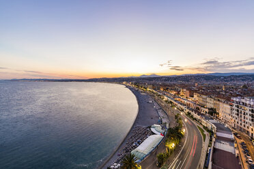 France, Provence-Alpes-Cote d'Azur, Nice, Promenade des Anglais, beach in the evening light - WDF04952