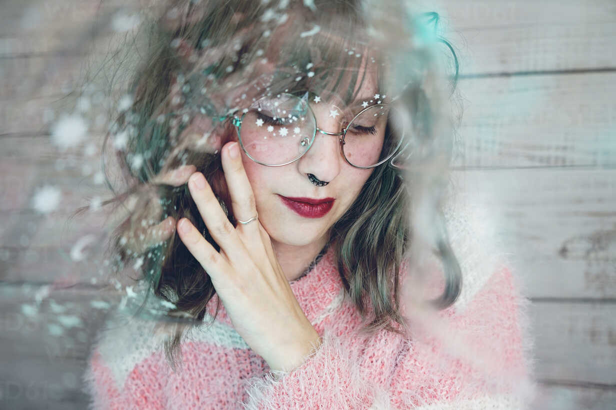 Portrait of beautiful woman wearing nose ring and glasses stock photo