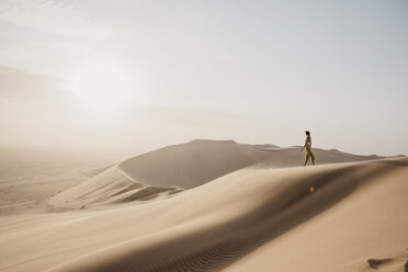 Namibia, Namib, woman on desert dune looking at view - LHPF00268