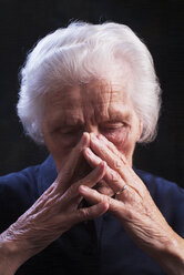 Portrait of an aged woman, looking sad - WWF04569