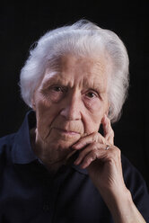 Portrait of an aged woman, looking sad - WWF04570